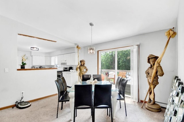 481 E Branch Rd, Patterson, NY 12563 - dining room with light carpet and a chandelier