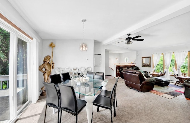 481 E Branch Rd, Patterson, NY 12563 - dining room featuring healthy amount of natural light, light carpet, beamed ceiling, a ceiling fan, and a chandelier