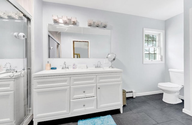 481 E Branch Rd, Patterson, NY 12563 - bathroom with double vanity, baseboard heating, and a shower with shower door