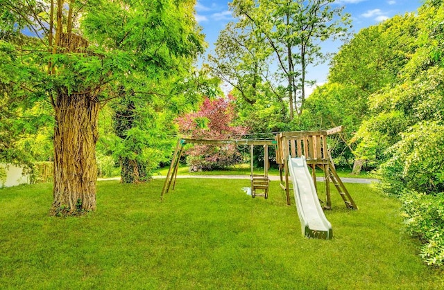 481 E Branch Rd, Patterson, NY 12563 - view of green lawn with a playground