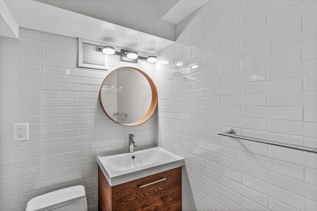 99-40 63rd Rd Unit 1Z, Rego Park, NY 11374 - bathroom with tile walls and vanity
