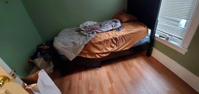 77 Carroll St, Poughkeepsie, NY 12601 - bedroom featuring wood finished floors