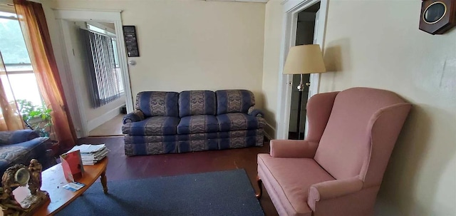77 Carroll St, Poughkeepsie, NY 12601 - living room featuring wood finished floors and baseboards