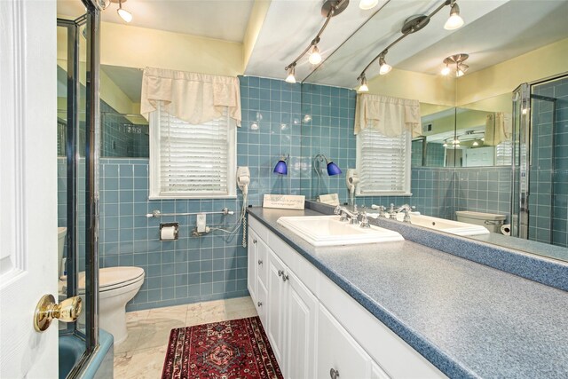 25 Fountain Dr, Valhalla, NY 10595 - full bath with tile walls, a tile shower, and vanity