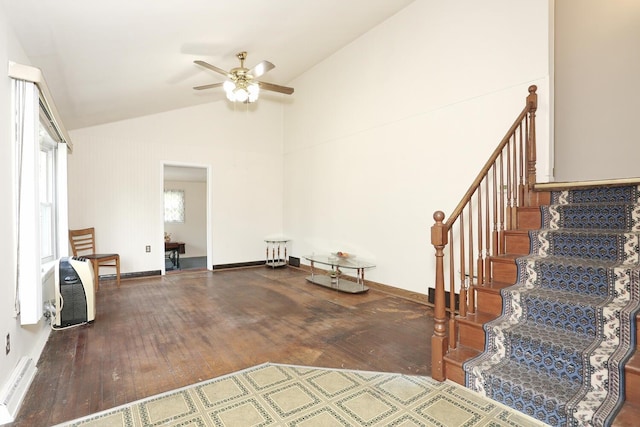 38 Wilson St, Middletown, NY 10940 - unfurnished room with hardwood / wood-style flooring, vaulted ceiling, ceiling fan, baseboard heating, and stairway