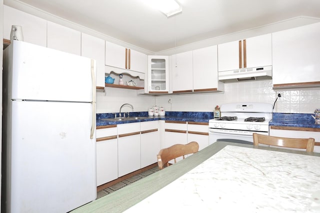 38 Wilson St, Middletown, NY 10940 - kitchen with white appliances, under cabinet range hood, decorative backsplash, and white cabinets