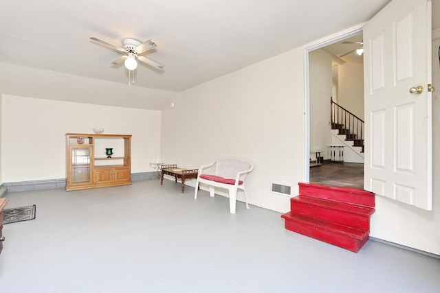 38 Wilson St, Middletown, NY 10940 - sitting room with ceiling fan, concrete flooring, stairs, and vaulted ceiling