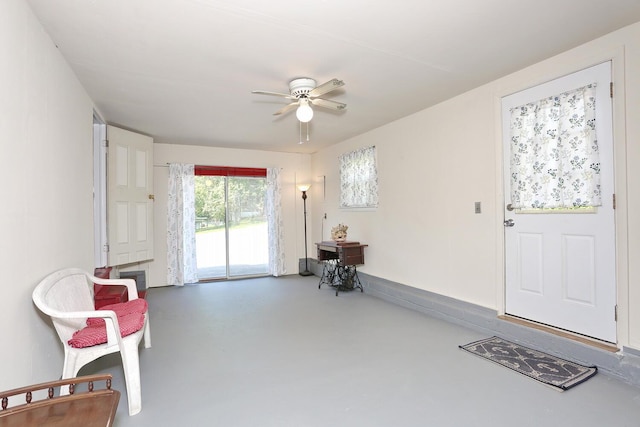 38 Wilson St, Middletown, NY 10940 - sitting room with ceiling fan and finished concrete flooring