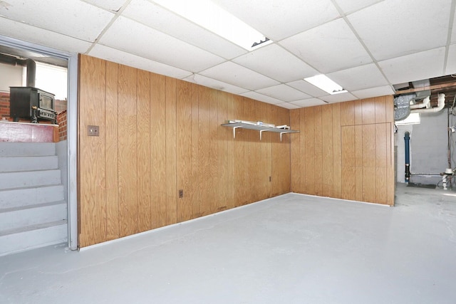 38 Wilson St, Middletown, NY 10940 - below grade area featuring a drop ceiling, wood walls, and stairs