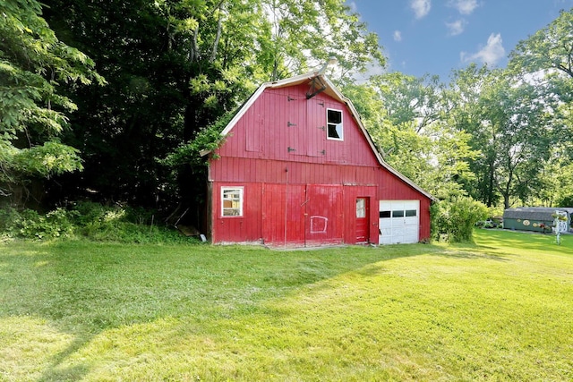 38 Wilson St, Middletown, NY 10940 - view of barn with a yard and driveway