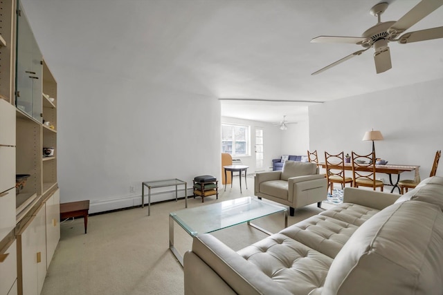 25 Chapel Pl Unit 3N, Great Neck, NY 11021 - living area featuring a ceiling fan and light colored carpet