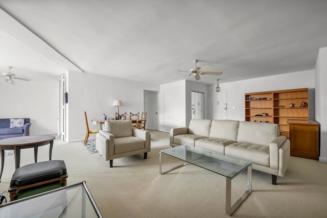 25 Chapel Pl Unit 3N, Great Neck, NY 11021 - living room with a ceiling fan, light colored carpet, and baseboards