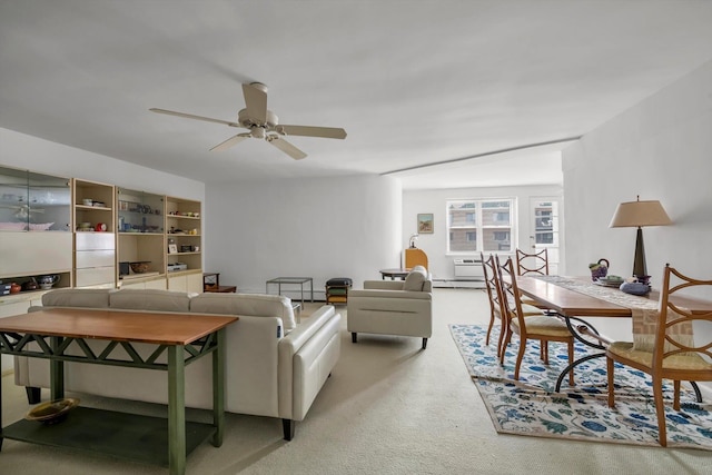 25 Chapel Pl Unit 3N, Great Neck, NY 11021 - living area with light colored carpet and ceiling fan