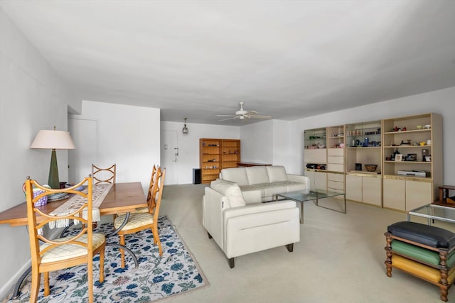 25 Chapel Pl Unit 3N, Great Neck, NY 11021 - living room with ceiling fan and light colored carpet