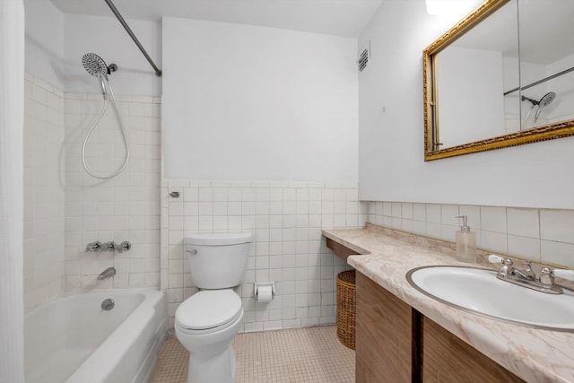 25 Chapel Pl Unit 3N, Great Neck, NY 11021 - bathroom with shower / tub combo, tile walls, toilet, tile patterned flooring, and vanity