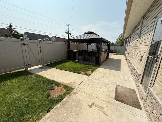 1803 Front St, East Meadow, NY 11554 - fenced backyard with a gazebo, a patio area, and a gate