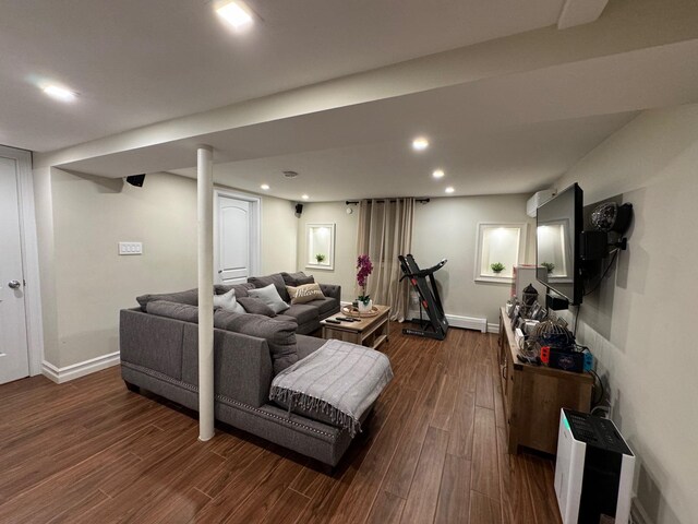 1803 Front St, East Meadow, NY 11554 - living room with dark wood-type flooring and recessed lighting