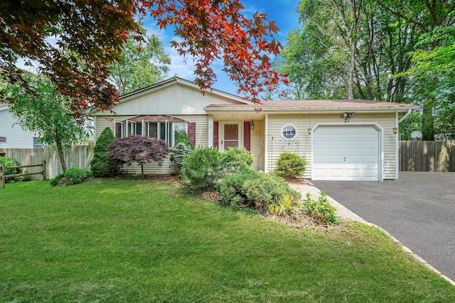 21 Spectacle Lake Dr, Smithtown, NY 11767 - ranch-style house featuring an attached garage and driveway