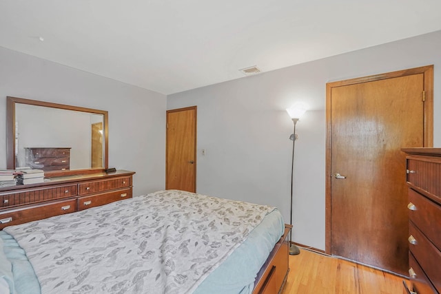 21 Spectacle Lake Dr, Smithtown, NY 11767 - bedroom featuring light wood-type flooring