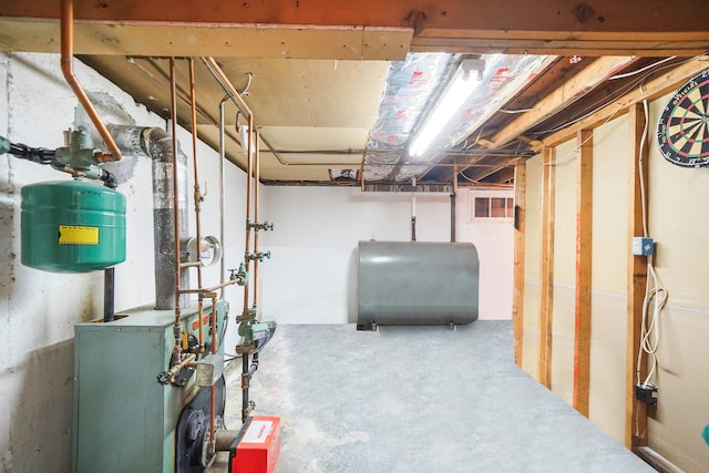 21 Spectacle Lake Dr, Smithtown, NY 11767 - unfinished below grade area featuring heating fuel and a heating unit