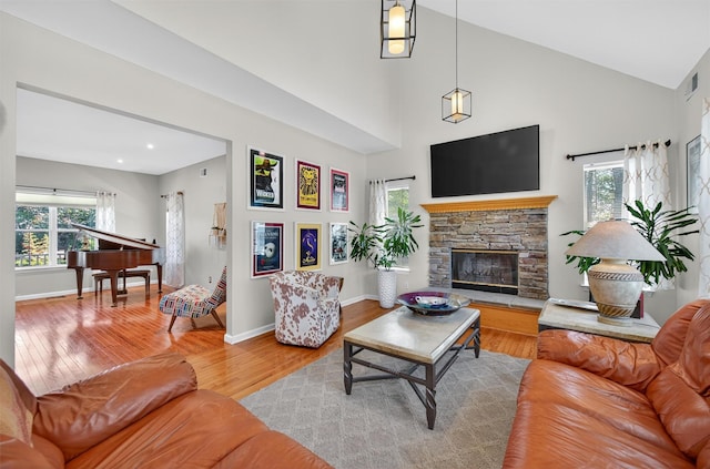 11 Pacer Ct, Goshen, NY 10924 - living room with wood finished floors, a fireplace, and high vaulted ceiling