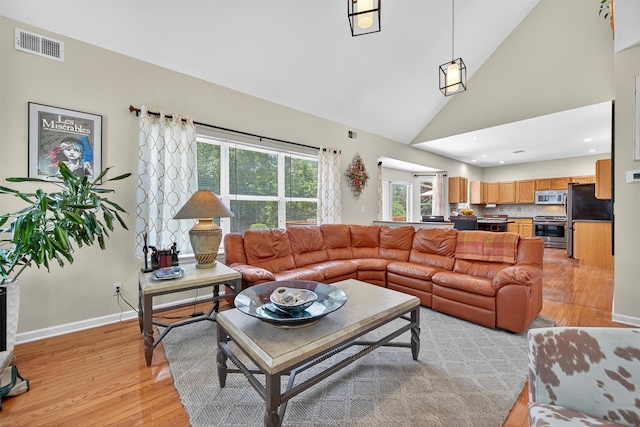 11 Pacer Ct, Goshen, NY 10924 - living room with light wood-style flooring, recessed lighting, and high vaulted ceiling