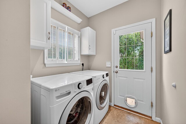 11 Pacer Ct, Goshen, NY 10924 - laundry room with washer and clothes dryer, cabinet space, and plenty of natural light