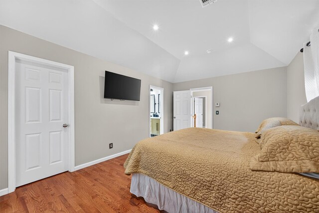 11 Pacer Ct, Goshen, NY 10924 - bedroom with wood finished floors, lofted ceiling, recessed lighting, and connected bathroom