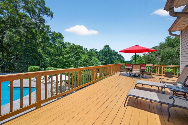 11 Pacer Ct, Goshen, NY 10924 - wooden deck featuring outdoor dining space and an outdoor pool