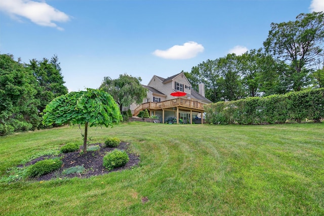 11 Pacer Ct, Goshen, NY 10924 - view of green lawn featuring a wooden deck
