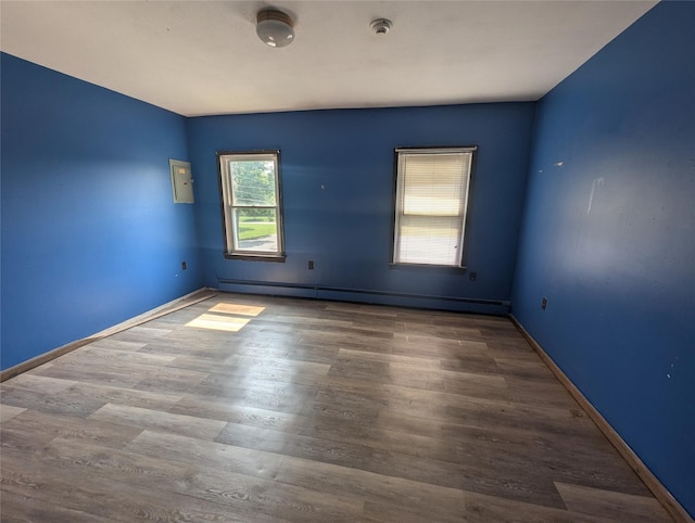 265 Goodwill Rd, Montgomery, NY 12549 - spare room with a baseboard radiator, wood finished floors, and a smoke detector