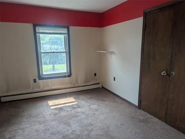 265 Goodwill Rd, Montgomery, NY 12549 - carpeted spare room featuring a baseboard radiator