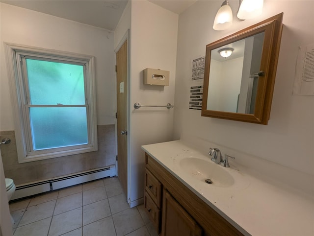 265 Goodwill Rd, Montgomery, NY 12549 - bathroom with baseboard heating, vanity, and tile patterned flooring