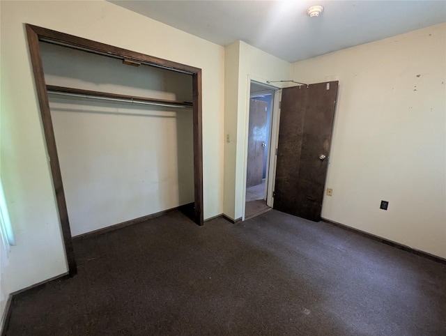265 Goodwill Rd, Montgomery, NY 12549 - unfurnished bedroom with a closet and dark colored carpet