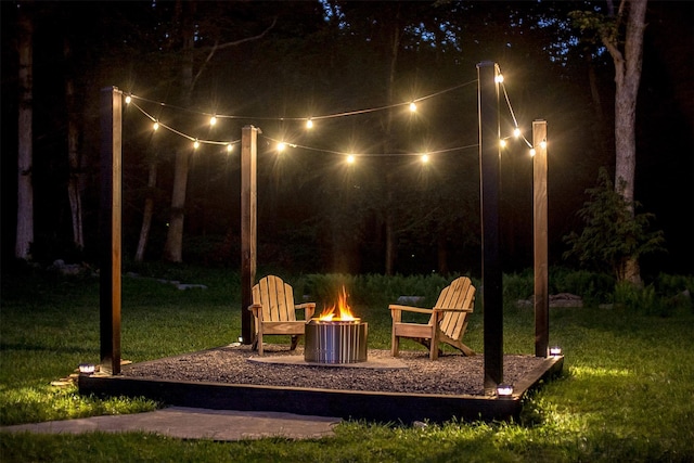 69 Akeson Rd, Glen Spey, NY 12737 - yard at night featuring a fire pit and a yard