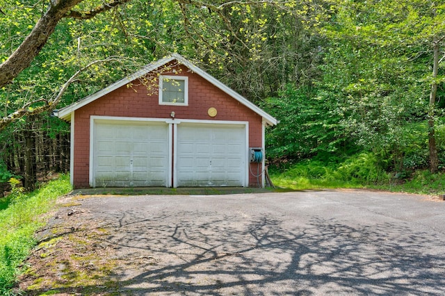69 Akeson Rd, Glen Spey, NY 12737 - detached garage with a view of trees