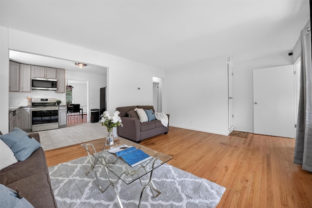 26 Helena Ave, Mohegan Lake, NY 10547 - living room with light wood-type flooring