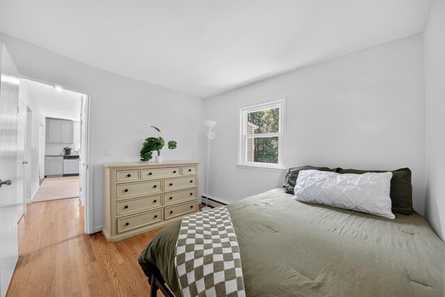 26 Helena Ave, Mohegan Lake, NY 10547 - bedroom with a baseboard radiator and light wood-type flooring