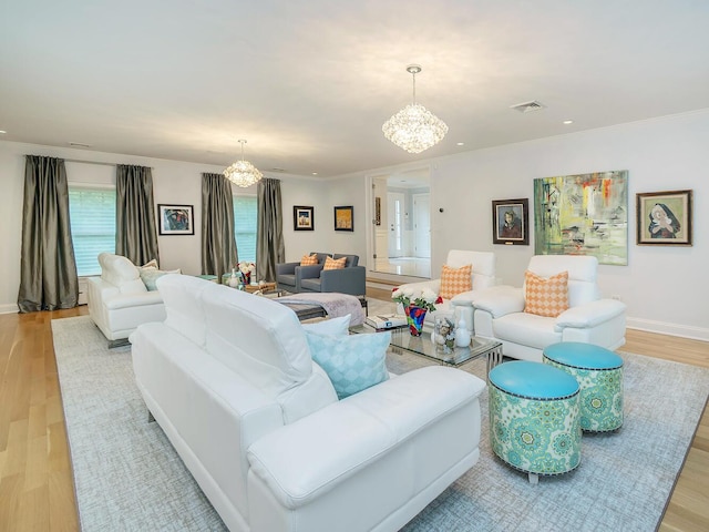 70 Scudders Ln, Roslyn Harbor, NY 11576 - living area with a chandelier, light wood-style flooring, and recessed lighting