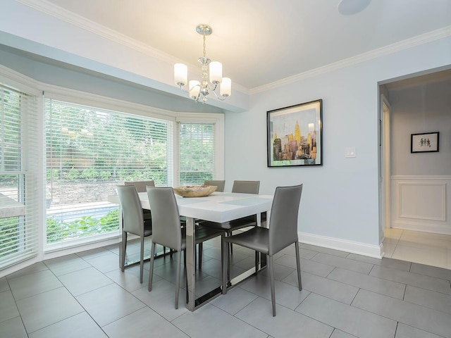 70 Scudders Ln, Roslyn Harbor, NY 11576 - tiled dining room featuring a chandelier and crown molding