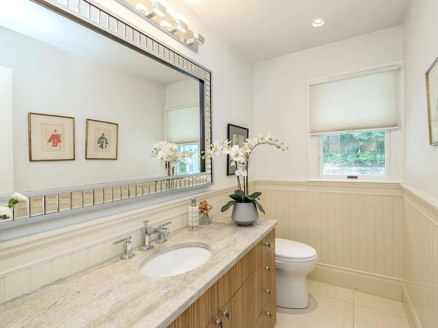 70 Scudders Ln, Roslyn Harbor, NY 11576 - bathroom with wainscoting, vanity, and tile patterned flooring