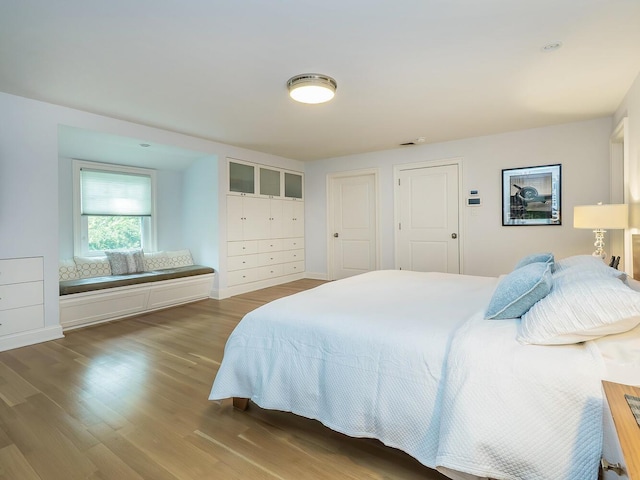 70 Scudders Ln, Roslyn Harbor, NY 11576 - bedroom featuring wood finished floors
