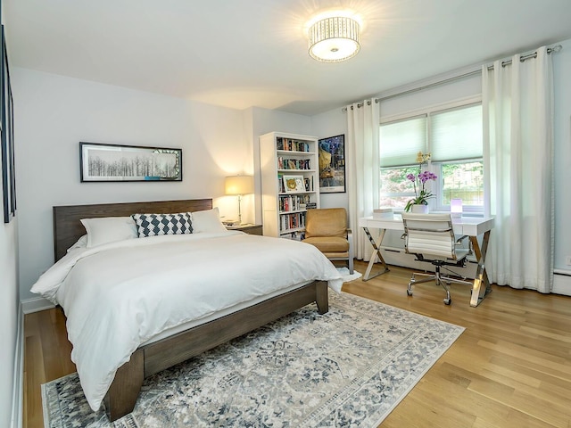 70 Scudders Ln, Roslyn Harbor, NY 11576 - bedroom featuring light wood-style floors