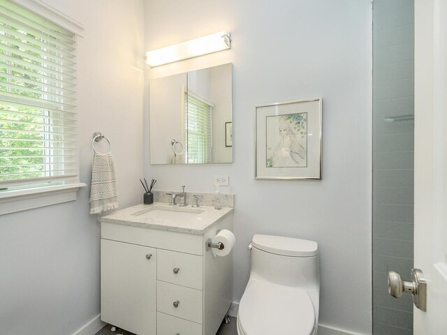70 Scudders Ln, Roslyn Harbor, NY 11576 - bathroom with vanity and baseboards