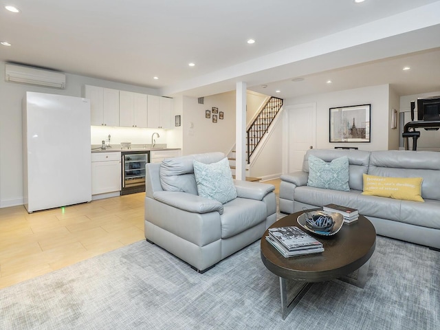 70 Scudders Ln, Roslyn Harbor, NY 11576 - living room featuring wine cooler, an AC wall unit, wet bar, stairway, and recessed lighting