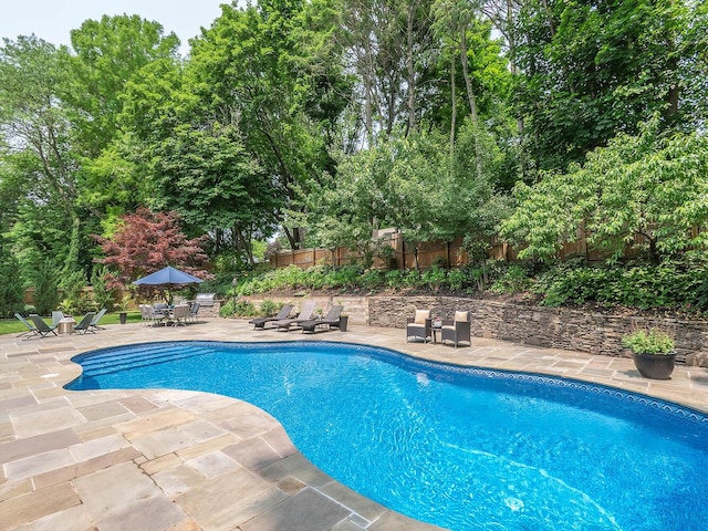 70 Scudders Ln, Roslyn Harbor, NY 11576 - view of swimming pool with a patio, a fenced backyard, and outdoor dining area
