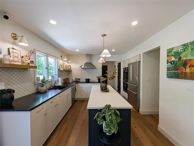 1 Concord Dr, Fort Salonga, NY 11768 - kitchen featuring wall chimney exhaust hood, appliances with stainless steel finishes, a center island, open shelves, and backsplash