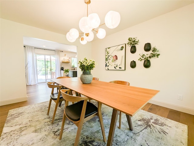 1 Concord Dr, Fort Salonga, NY 11768 - dining room with wood finished floors and a chandelier