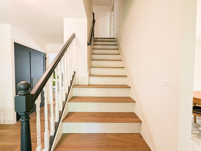 1 Concord Dr, Fort Salonga, NY 11768 - stairs featuring wood finished floors and baseboards