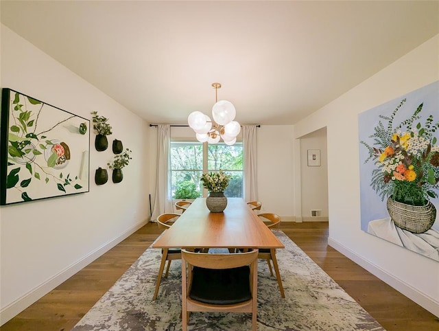 1 Concord Dr, Fort Salonga, NY 11768 - dining room with a chandelier and wood finished floors